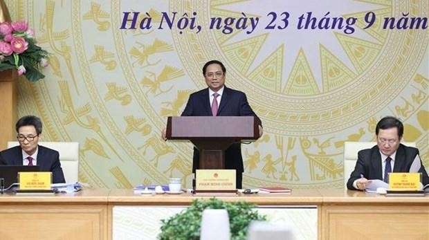 Prime Minister Pham Minh Chinh delivers a speech at a conference on developing the science and technology market on September 23. (Photo: VNA)