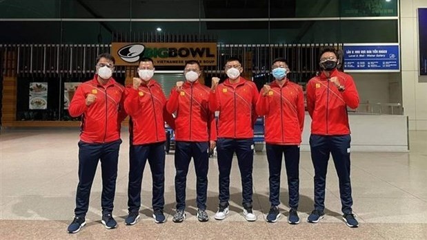 Members of the Vietnamese tennis team pose for a group photo (Photo: VNA)