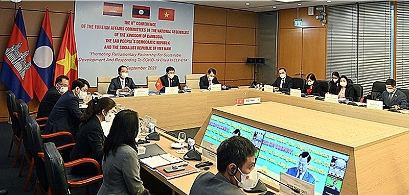 The Vietnamese delegates attend the event in Hanoi. 
