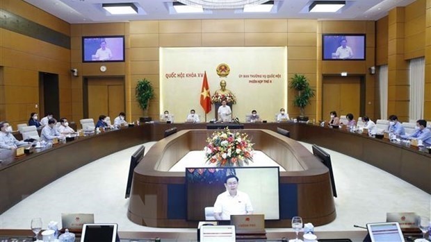 A session of the NA Standing Committee (Photo: VNA)