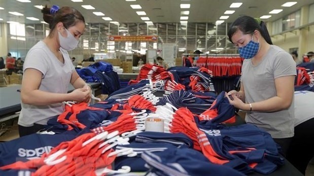 Workers put final touches on garment for export to the EU at a factory in Thai Nguyen province. (Photo: VNA)