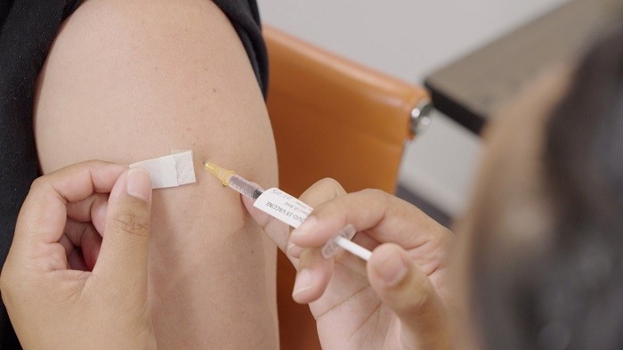 About 93% of New Zealand's population over the age of 12 are fully vaccinated and about 20% have had booster shots. 