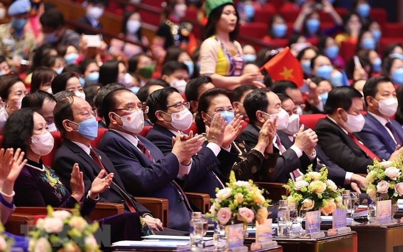 Prime Minister Pham Minh Chinh and delegates attend the congress’s opening ceremony. (Photo: Duong Giang/VNA)