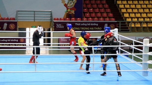 Vietnam's kickboxers are training to prepare for SEA Games 31. (Photo: VNA)