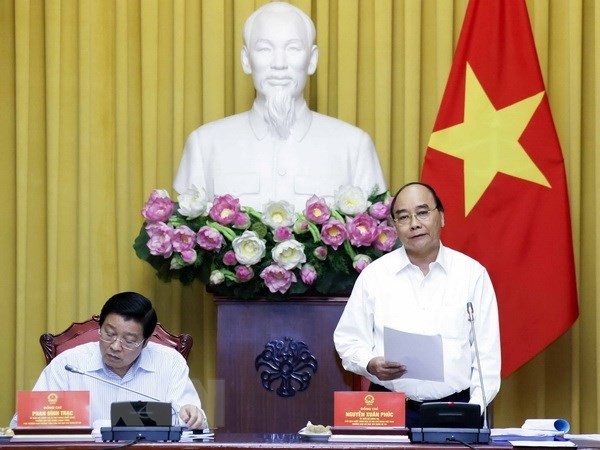 President Nguyen Xuan Phuc speaking at the working session (Photo: VNA)
