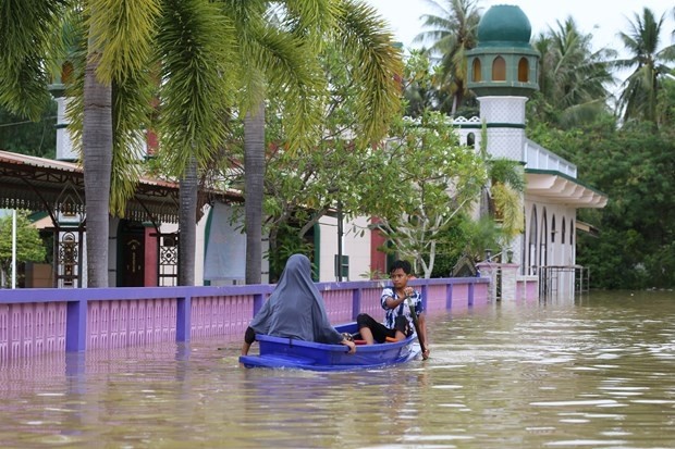 Floods after heavy rains in Pattani, Thailand. (Photo: AFP/VNA)