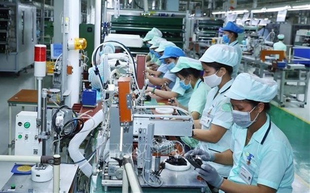 Manufacturing speakers and mobile phone headsets at Foster Electronics Co. Ltd at Vietnam Singapore Industrial Park (VSIP) Bac Ninh in Tu Son township, Bac Ninh province. (Photo: VNA)