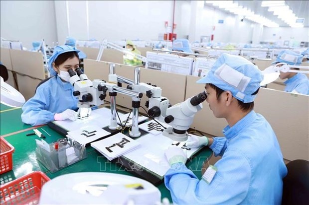 More and more Chinese consumer electronics manufacturers have recently set up new factories in Vietnam - Illustrative image (Photo: VNA)