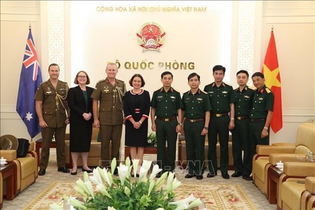 Defence Minister Gen. Phan Van Giang (fifth from right), Australian Ambassador Robyn Mudie (fourth from left), and other officials at the meeting on June 24 (Photo: VNA)
