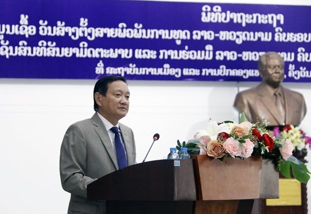 Vietnamese Ambassador to Laos Nguyen Ba Hung speaks at the event in Vientiane on June 24. (Photo: VNA)