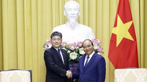President Nguyen Xuan Phuc (R) receives Japanese Minister of Justice Furukawa Yoshihisa (Photo: VNA) 