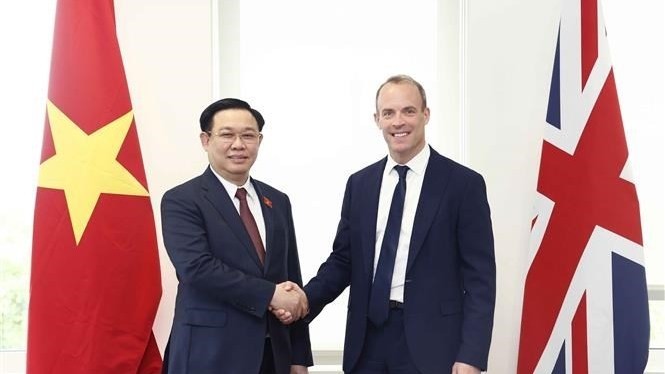 National Assembly Chairman Vuong Dinh Hue and UK Deputy Prime Minister and Justice Secretary Dominic Raab. (Photo: VNA)