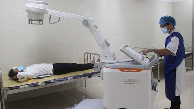 Many hospitals nationwide have been equipped with advanced machinery to serve medical examination and treatment. (Photo: VNA) 