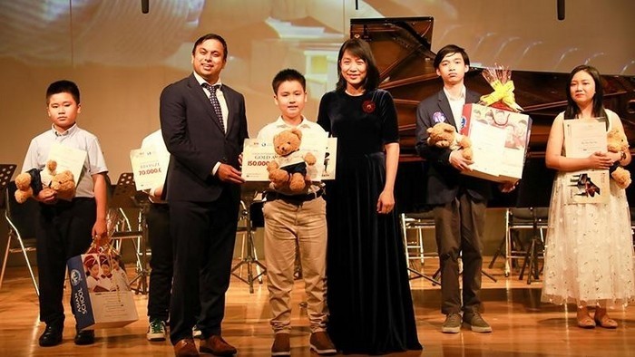 Contestant Nguyen Tran Quoc Thang won the Asian School's golden prize in Group A. (Photo: NDO)