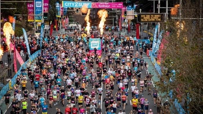 More than 60,000 people thronged Australia's Sydney's streets on Sunday for an annual road running event and mass party that returned for the first time since the COVID-19 pandemic began.
