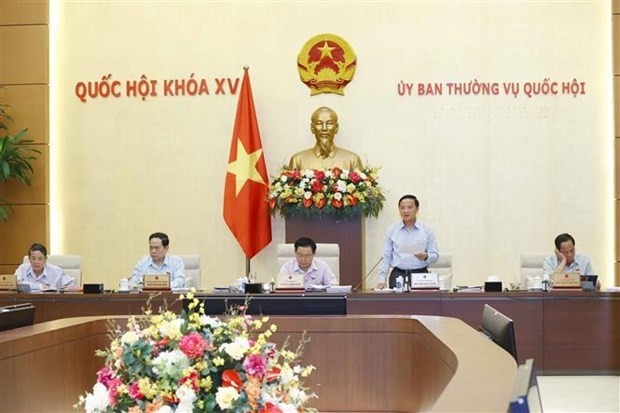 NA Vice Chairman Nguyen Khac Dinh speaks at the event (Photo: VNA)