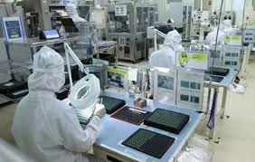 Workers produce electronic components at Mtex Viet Nam Co Ltd