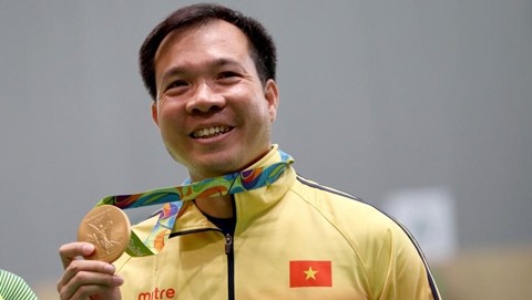 Hoang Xuan Vinh wins the first-ever Olympic gold medal for Vietnam