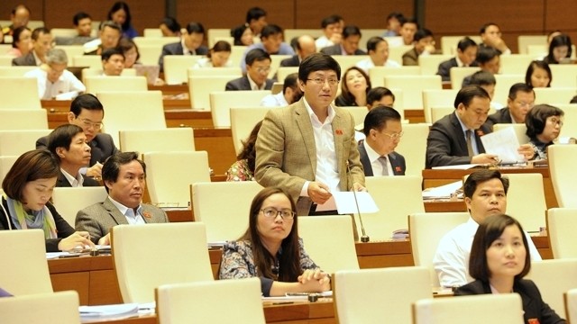 NA deputies at a debate of the ongoing second session of the Fourteenth NA in Hanoi. (Credit: NDO)