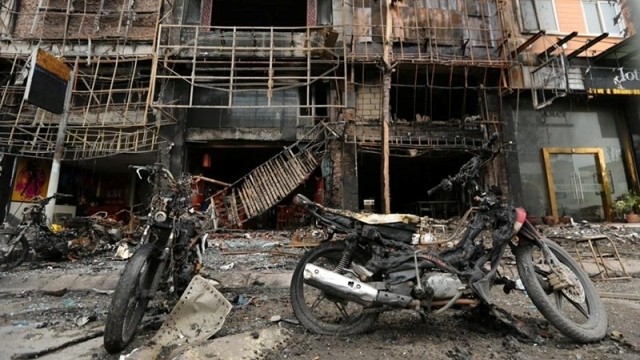 In addition to killing thirteen, the fire also destroyed several motorbikes and electronic bikes and burned nearby buildings.