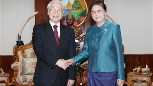 Party General Secretary Nguyen Phu Trong (L) and Chairwoman of the Lao National Assembly Pany Yathotou (Source: VNA) 