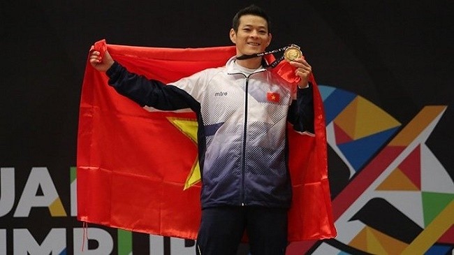 Thach Kim Tuan wins the men's 56kg category.