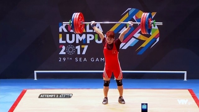 Weightlifter Trinh Van Vinh wins the gold medal in in the men 62kg event and also breaks two SEA Games records on August 28. (Screenshot capture)