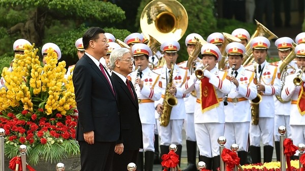 Party General Secretary Nguyen Phu Trong and Chinese Party General Secretary and President Xi Jinping at the welcome ceremony (Credit: VGP)