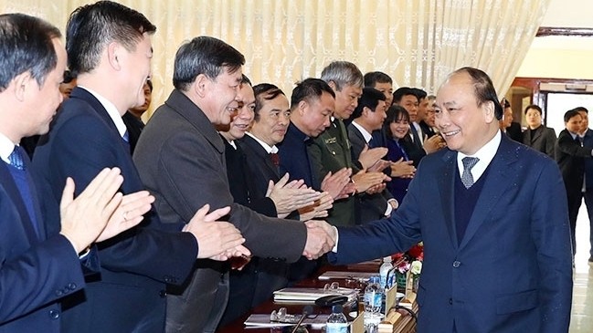 Prime Minister Nguyen Xuan Phuc with Yen Bai province leaders (Photo: VNA)