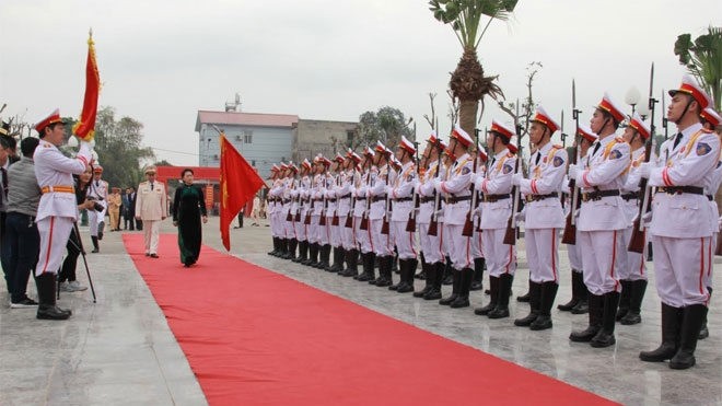 National Assembly Chairwoman Nguyen Thi Kim Ngan reviews the guard of honour at a ceremony to mark President Ho Chi Minh's teachings to police officers.