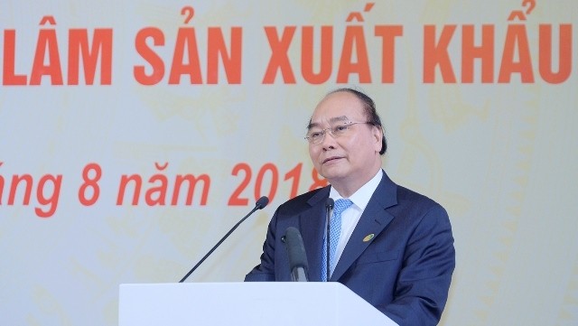PM Nguyen Xuan Phuc has set a target of making Vietnam a leading centre of timber and forest product production and export. (Photo: VGP)