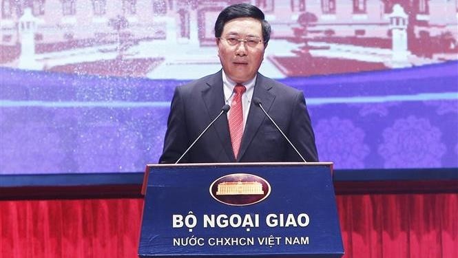 Deputy Prime Minister and Foreign Minister Pham Binh Minh speaking at the conference (photo: VNA)