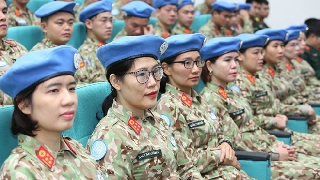 Members of the level-2 field hospital No. 2 at the opening ceremony of the pre-deployment training course in Hanoi on December 13. (Photo: VNA)