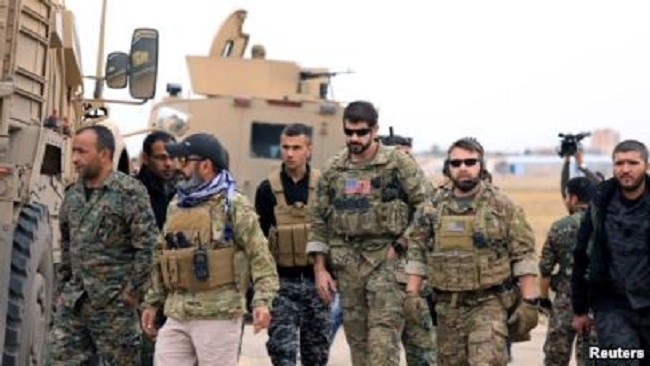 Syrian Democratic Forces and US troops are seen during a patrol near Turkish border in Hasakah, Syria, November 4, 2018. (Photo: Reuters)