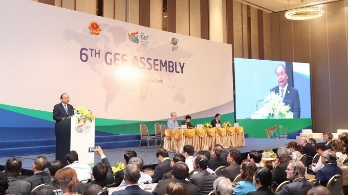 Prime Minister Nguyen Xuan Phuc addresses the opening session of the sixth Global Environment Fund Assembly in Da Nang city on June 27, 2018.