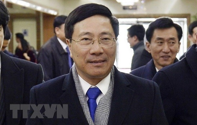 Deputy Prime Minister and Foreign Minister Pham Binh Minh in Pyongyang on February 12 (Photo: Kyodo/VNA)