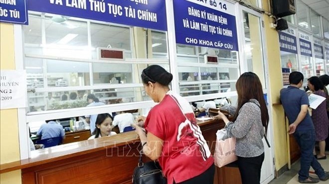 Patients register for medical services at the Hanoi-based Saint Paul Hospital (Photo: VNA)