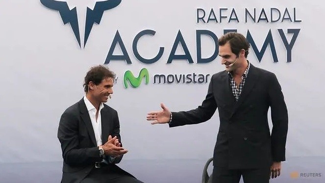 FILE PHOTO: Switzerland's Roger Federer reaches out his hand to Spain's Rafael Nadal during the opening ceremony of the Rafa Nadal tennis academy in Manacor, Spain, October 19, 2016. (Reuters)
