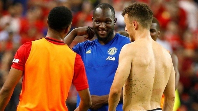 Romelu Lukaku (C) joins Inter for a fee reported to be around 80 million euros. (Reuters)