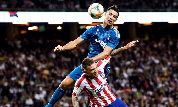 Soccer Football - International Champions Cup - Atletico Madrid v Juventus - Friends Arena - Stockholm, Sweden - August 10, 2019. Juventus' Cristiano Ronaldo in action with Atletico Madrid's Kieran Trippier. (Reuters)