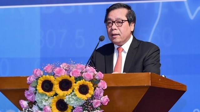Vice Governor of the State Bank of Vietnam Nguyen Kim Anh speaks at the opening session.