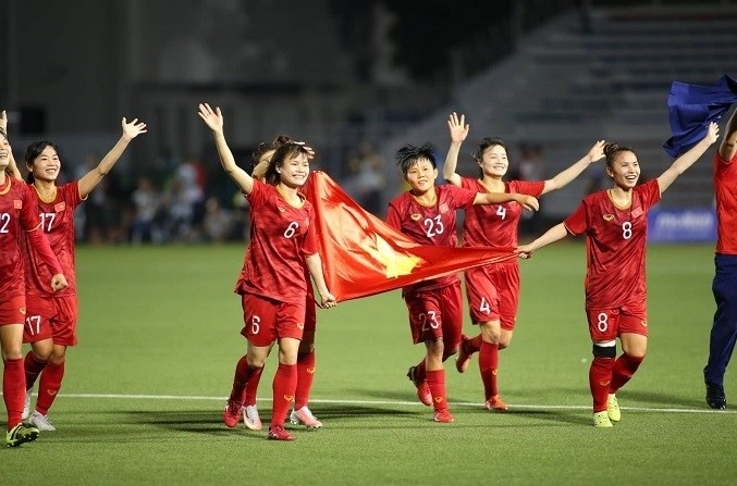 Vietnamese players celebrate after their title match against Thailand on December 8.