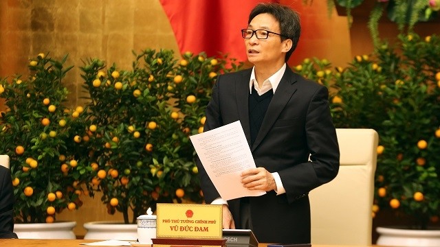 Deputy PM Vu Duc Dam speaks at the meeting on February 14. (Photo: VGP)