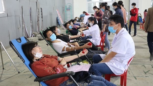 Volunteers donate blood in the programme in Ninh Binh province on February 14. (Photo: VNA)