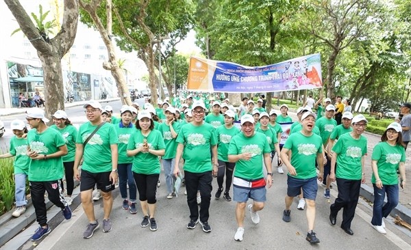 The walk aims to raise public awareness of environmental protection. (Photo: VNA)