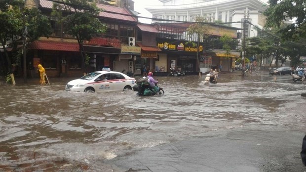 Hanoi streets flooded after a heavy rain (Source: VNA)