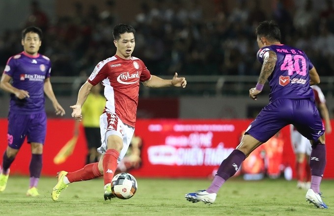 V.League - Matchday 4 - Ho Chi Minh City vs Saigon FC - Thong Nhat Stadium - June 12, 2020 Ho Chi Minh City's Nguyen Cong Phuong (in red) in action during the match.