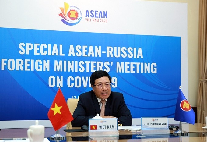 Deputy Prime Minister and Foreign Minister Pham Binh Minh attends the Special ASEAN-Russia Foreign Ministers Meeting on COVID-19. (Photo: VGP)