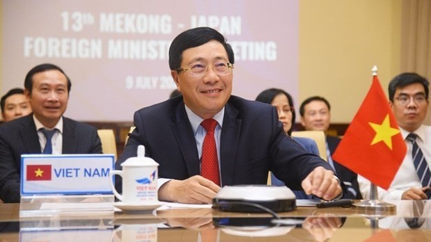 Vietnamese Deputy Prime Minister and Minister of Foreign Affairs Pham Binh Minh co-chairs the 13th Mekong - Japan Ministerial Conference on July 9 (Photo: VNA)