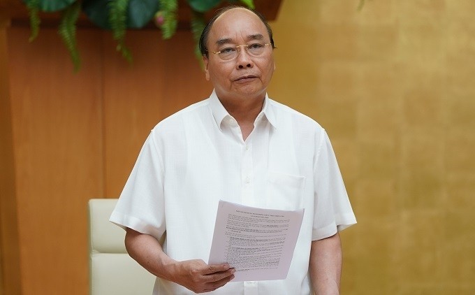 Prime Minister Nguyen Xuan Phuc speaks at the working session. (Photo: VGP)